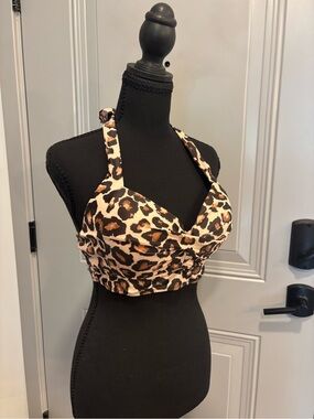 Leopard print bikini top. Molded cups. Size large. Fits D-DD